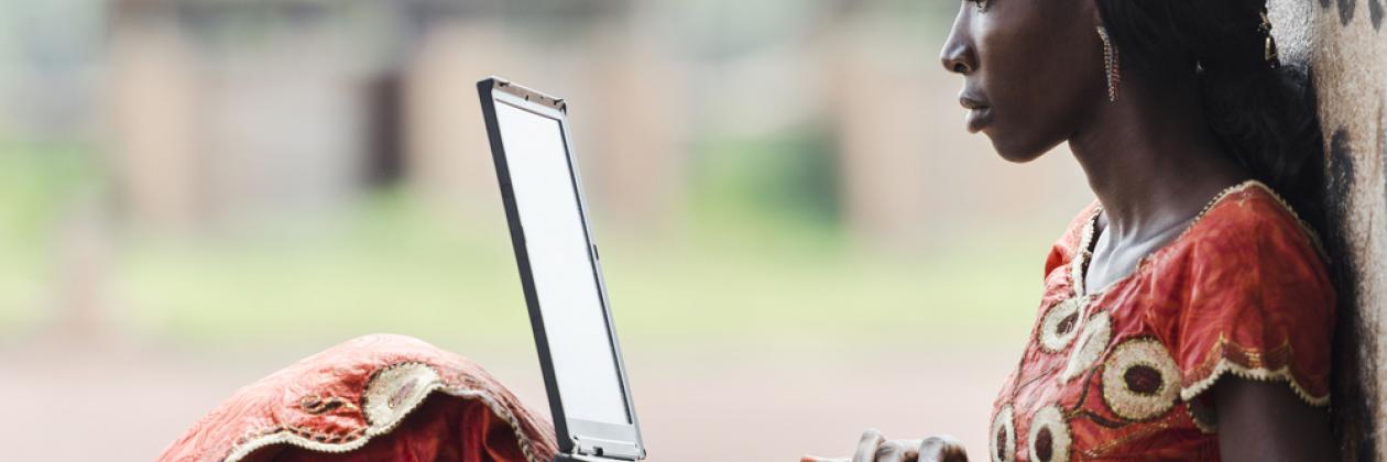 African woman using laptop